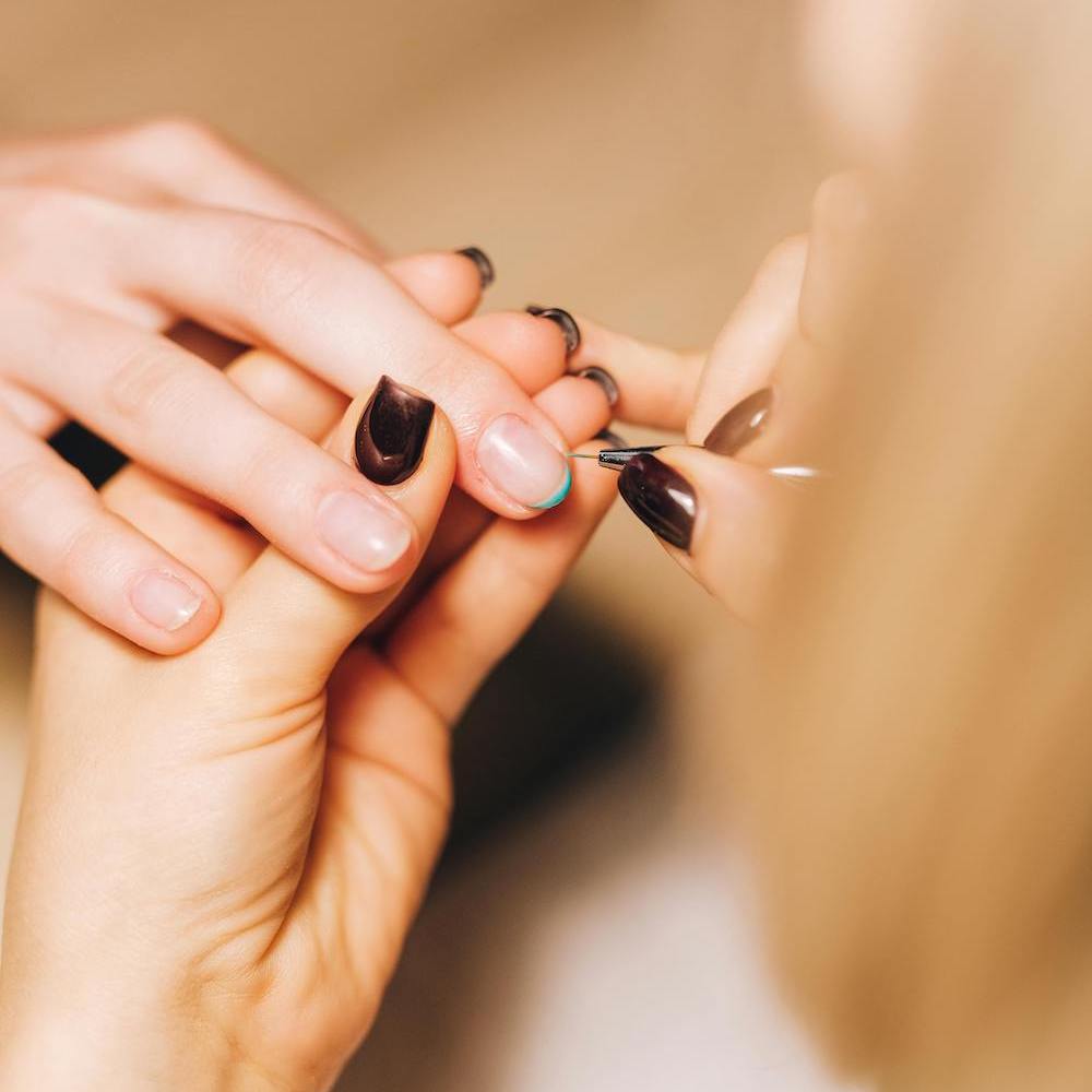 Close-up of high-precision Russian Manicure Bali e-file technique